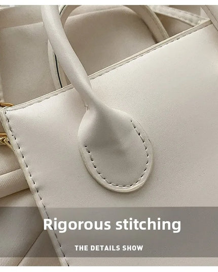 Elegant Black Handbag with Dual Handles