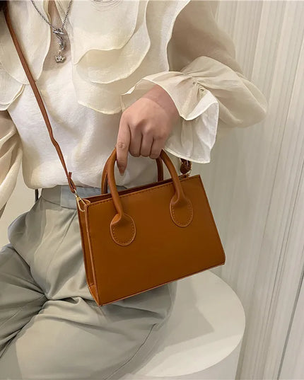 Elegant Black Handbag with Dual Handles
