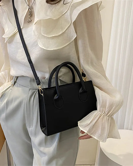Elegant Black Handbag with Dual Handles