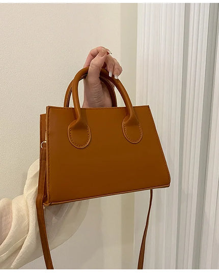 Elegant Black Handbag with Dual Handles