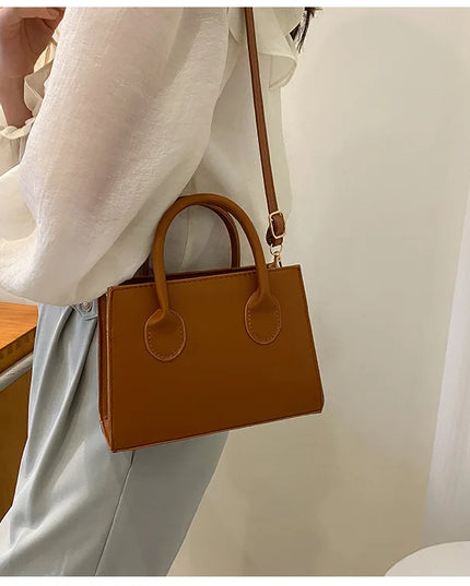 Elegant Black Handbag with Dual Handles