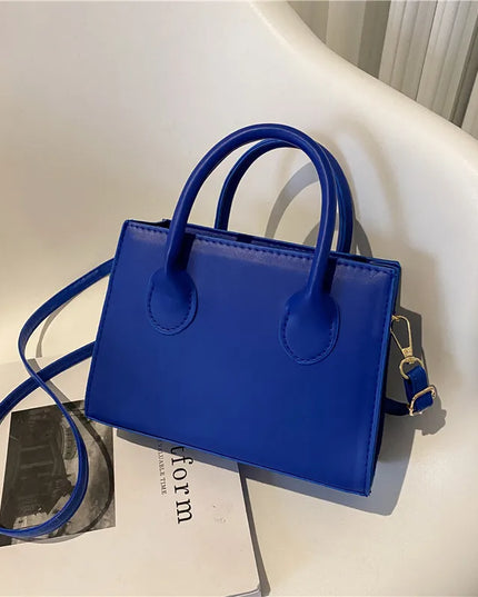 Elegant Black Handbag with Dual Handles
