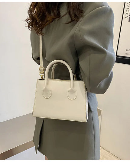 Elegant Black Handbag with Dual Handles