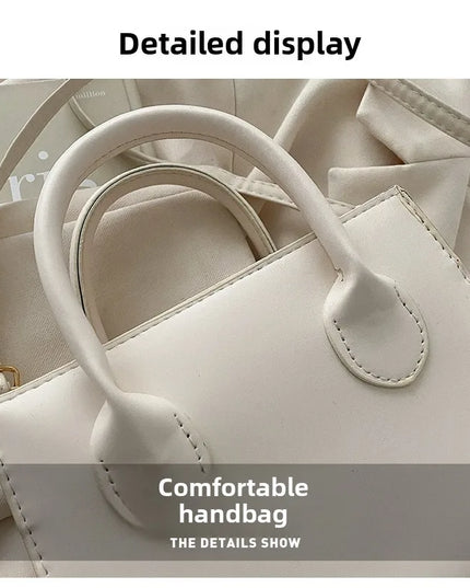 Elegant Black Handbag with Dual Handles