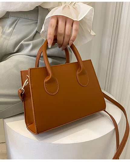 Elegant Black Handbag with Dual Handles