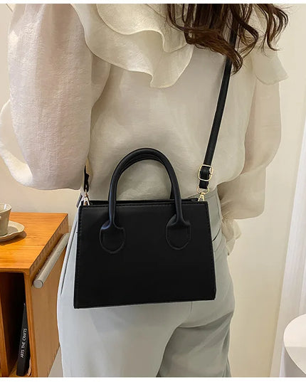 Elegant Black Handbag with Dual Handles