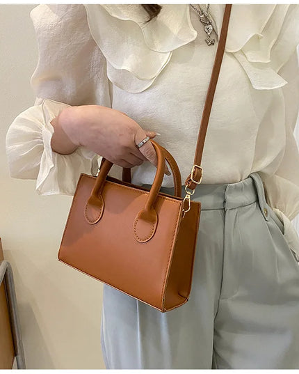 Elegant Black Handbag with Dual Handles