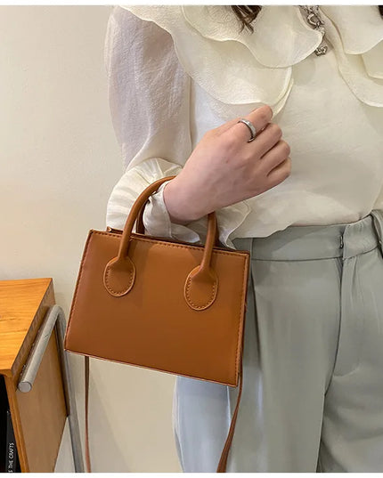 Elegant Black Handbag with Dual Handles
