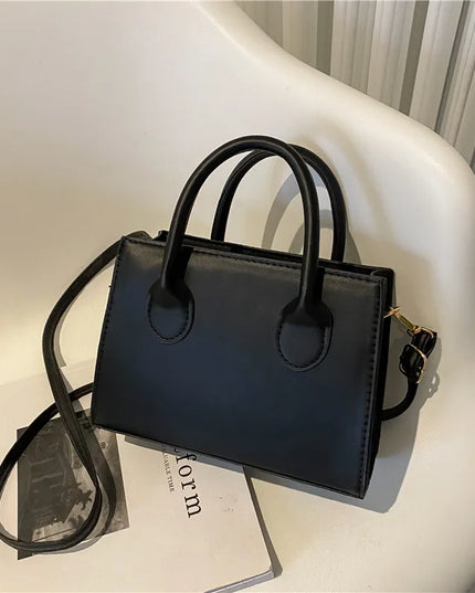 Elegant Black Handbag with Dual Handles