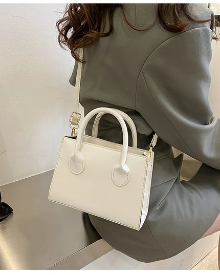 Elegant Black Handbag with Dual Handles