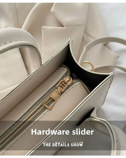Elegant Black Handbag with Dual Handles