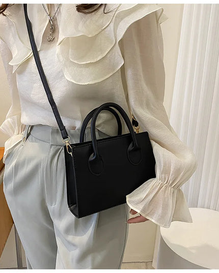 Elegant Black Handbag with Dual Handles