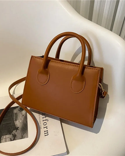 Elegant Black Handbag with Dual Handles