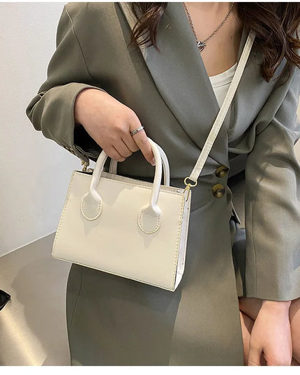Elegant Black Handbag with Dual Handles