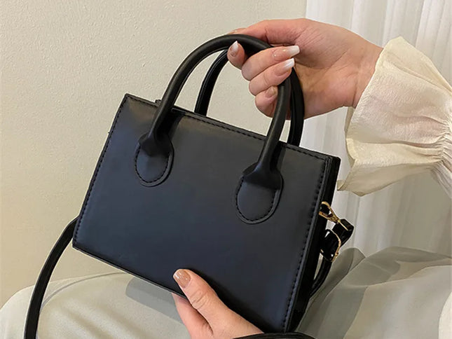 Elegant Black Handbag with Dual Handles