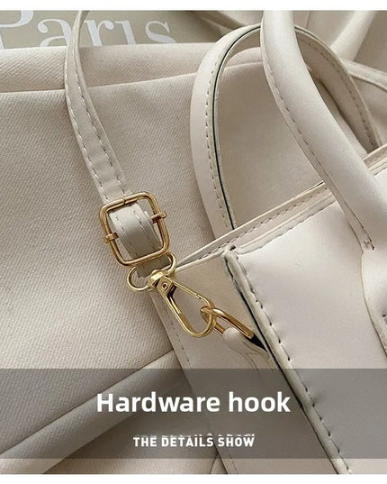 Elegant Black Handbag with Dual Handles