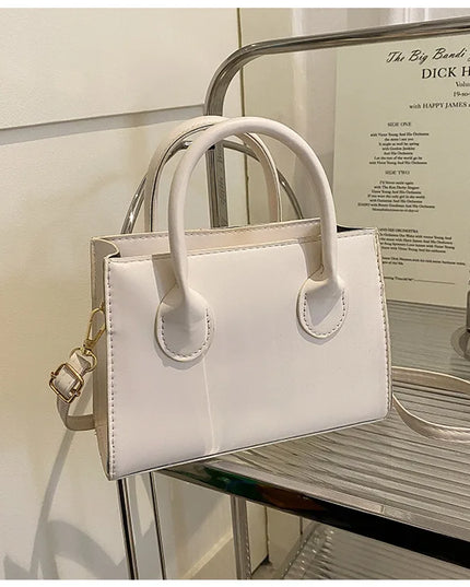 Elegant Black Handbag with Dual Handles