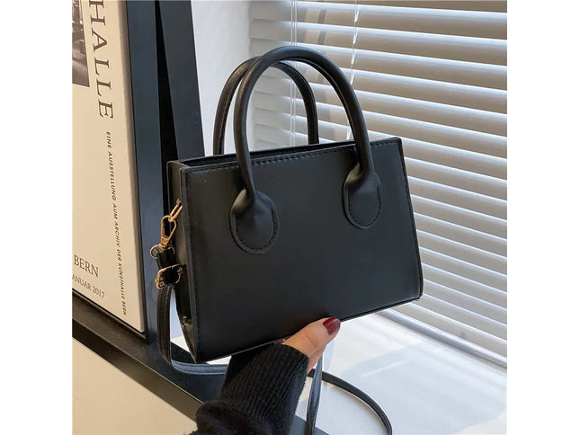 Elegant Black Handbag with Dual Handles