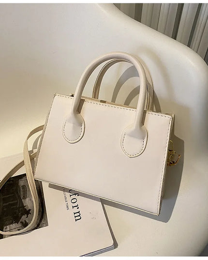 Elegant Black Handbag with Dual Handles