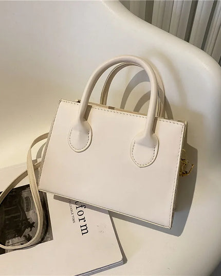 Elegant Black Handbag with Dual Handles